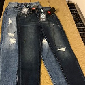 2 pair size 26LuLaRoe skinny distressed jeans